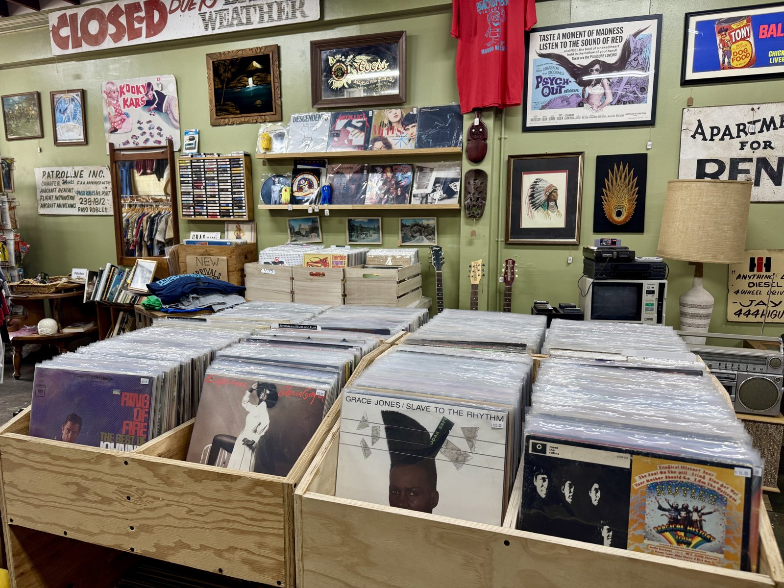 Record bins and wall art inside Beachcomber Vintage.