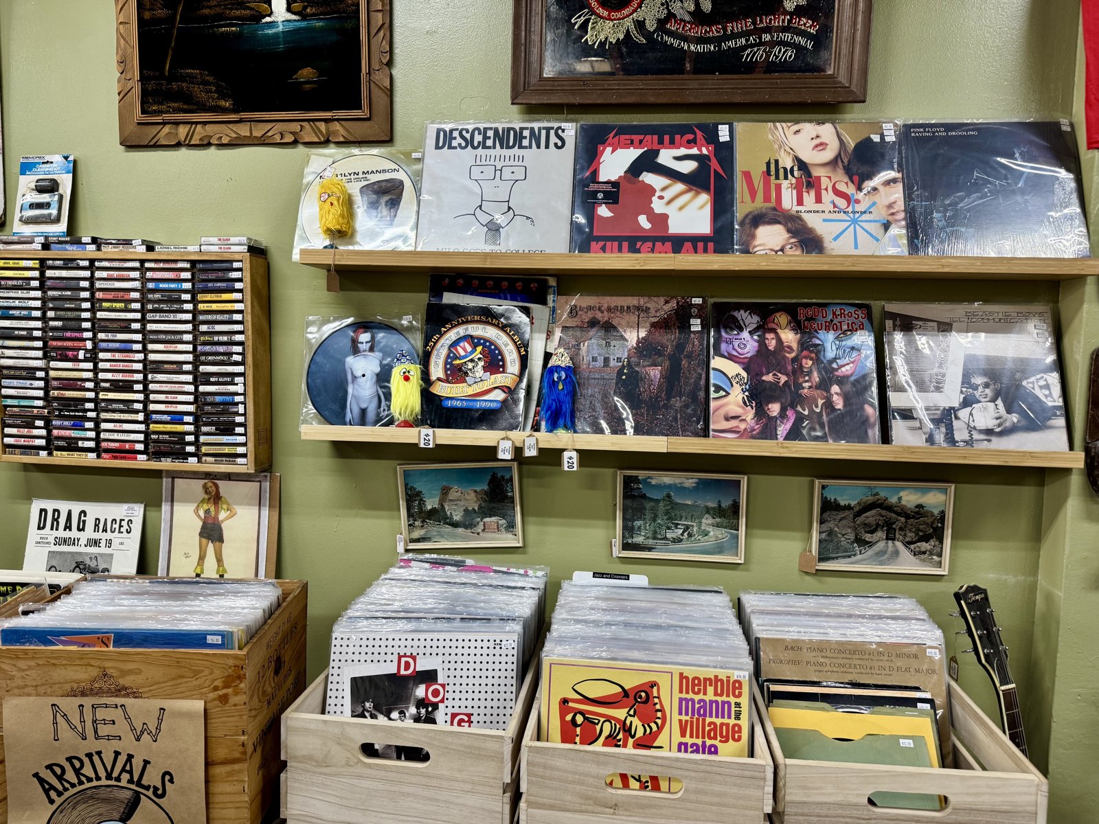Cassette tapes, records, and wall shelves inside Beachcomber Vintage.